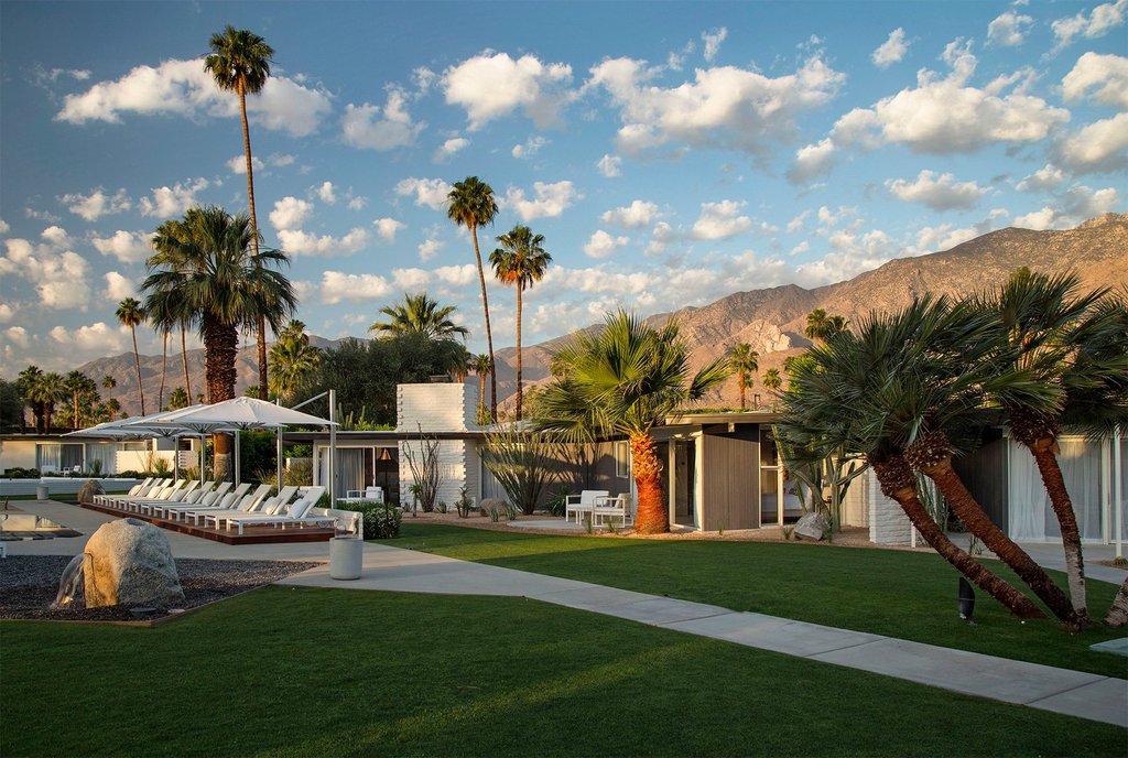 Sunloungers beside the yoga lawn at our luxurious resort in Palm Springs.
